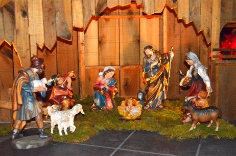 A nativity scene with the birth of jesus.